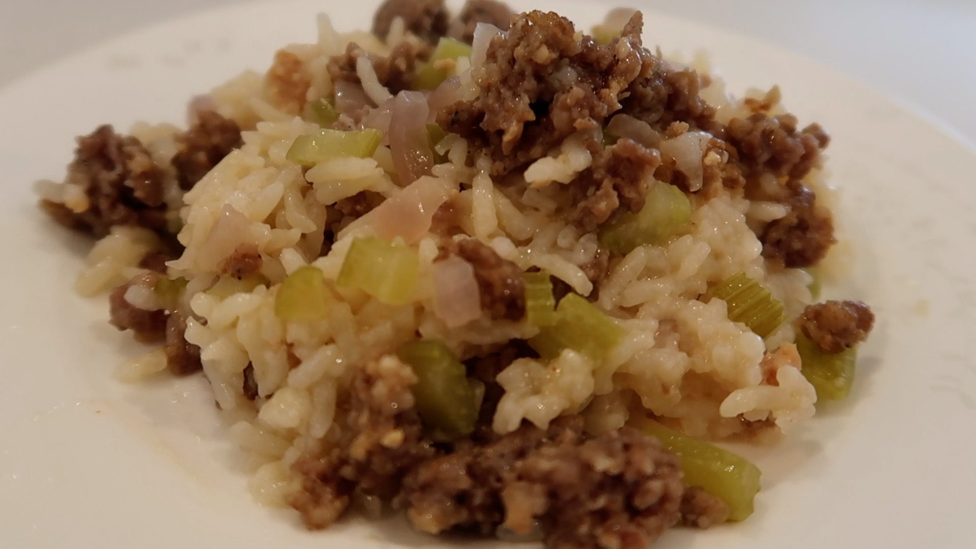 Sausage and Rice Casserole displayed on a white plate