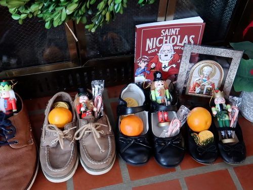 St. Nicholas Day Traditions showing shoes filled with candy and treats