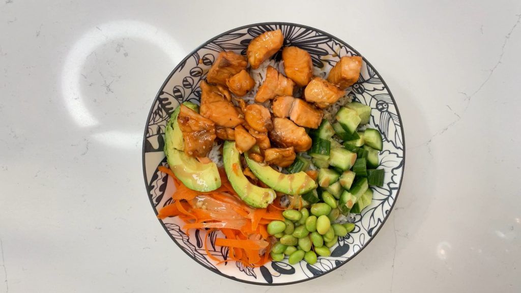 Asian Salmon Rice Bowls served in a decorative bowl